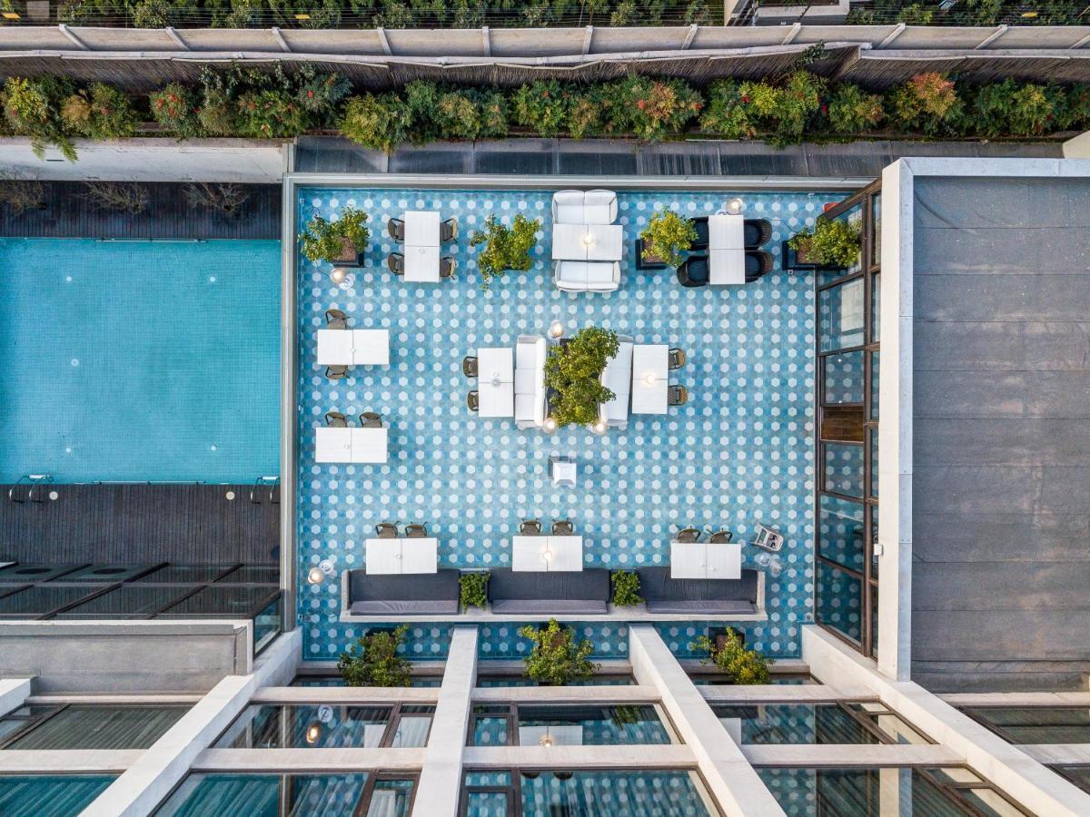 Hotel Wyndham Santiago Pettra Exterior foto The rooftop pool at the hotel